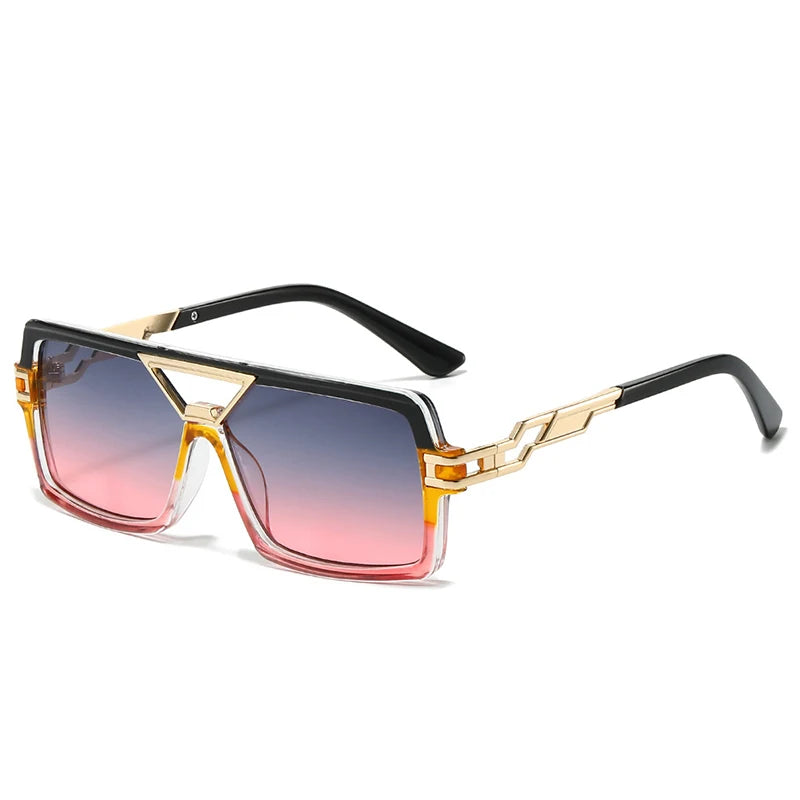 Sunglasses with gold and black frame and pink gradient lenses on a white background