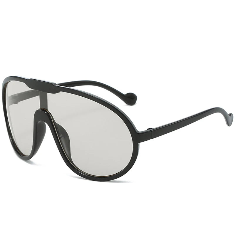 Black sunglasses with a reflective lens on a white background