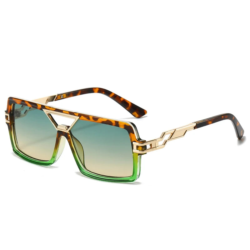 Sunglasses with tortoiseshell frame and green gradient lenses on a white background