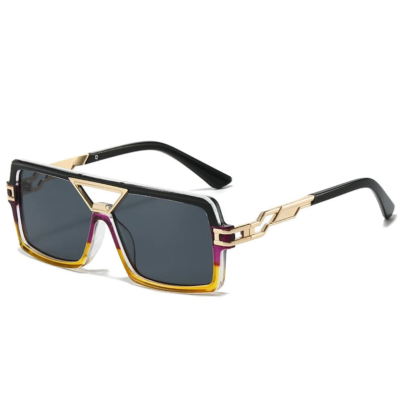 Sunglasses with a gold and black frame on a white background
