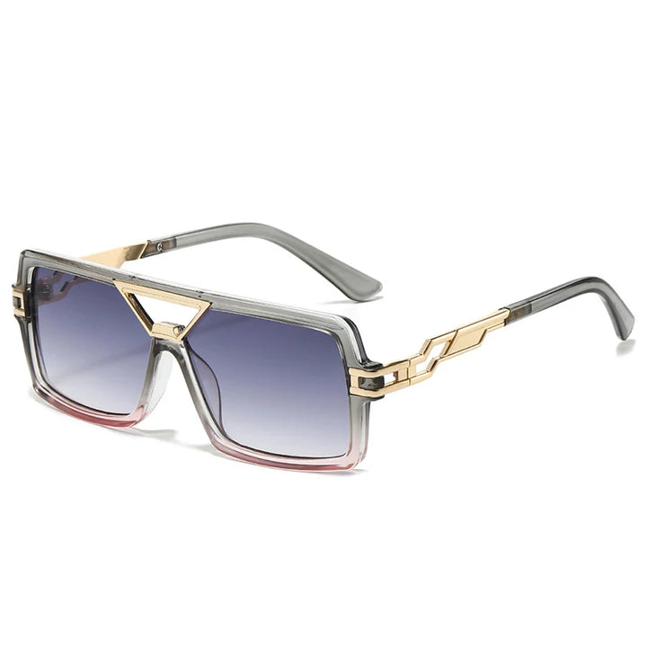 Sunglasses with gold frame and gray gradient lenses on a white background