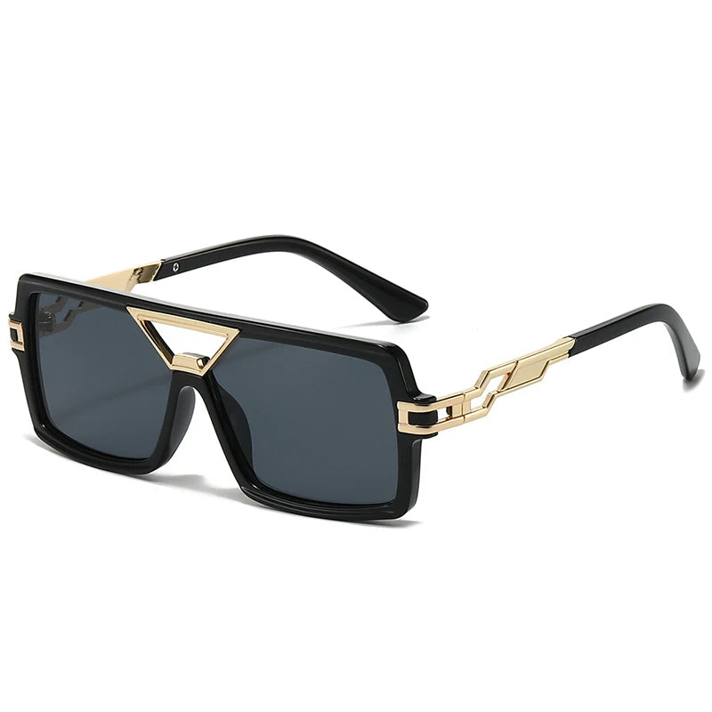 Sunglasses with black frame and gold accents on a white background