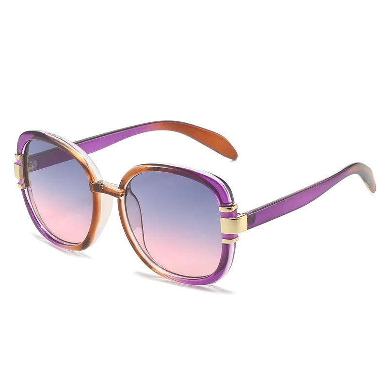 Sunglasses with a gradient purple and pink design on a white background