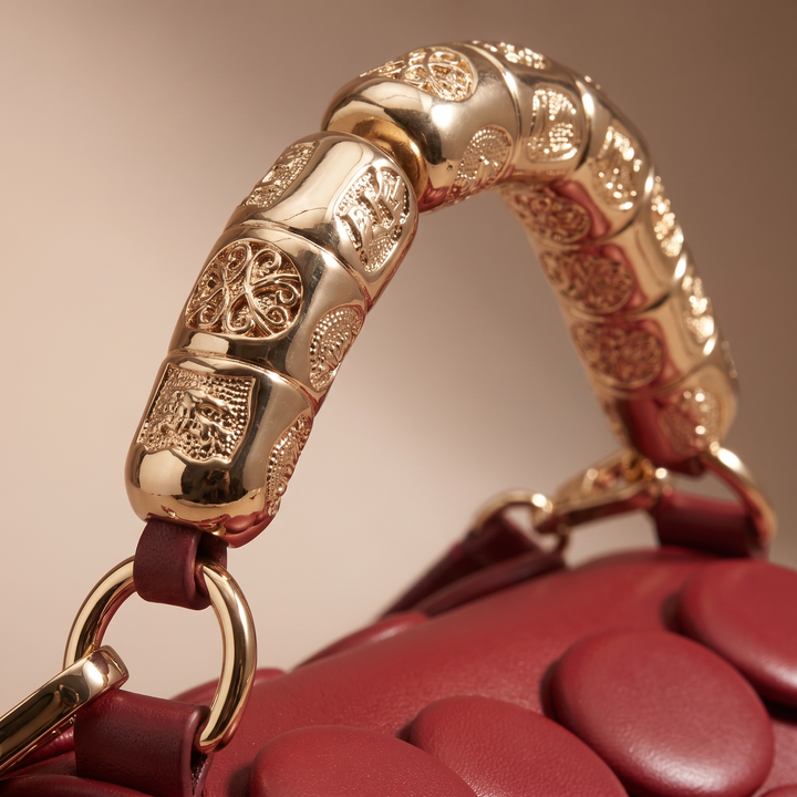 Aurette Sculpted Disc Handbag